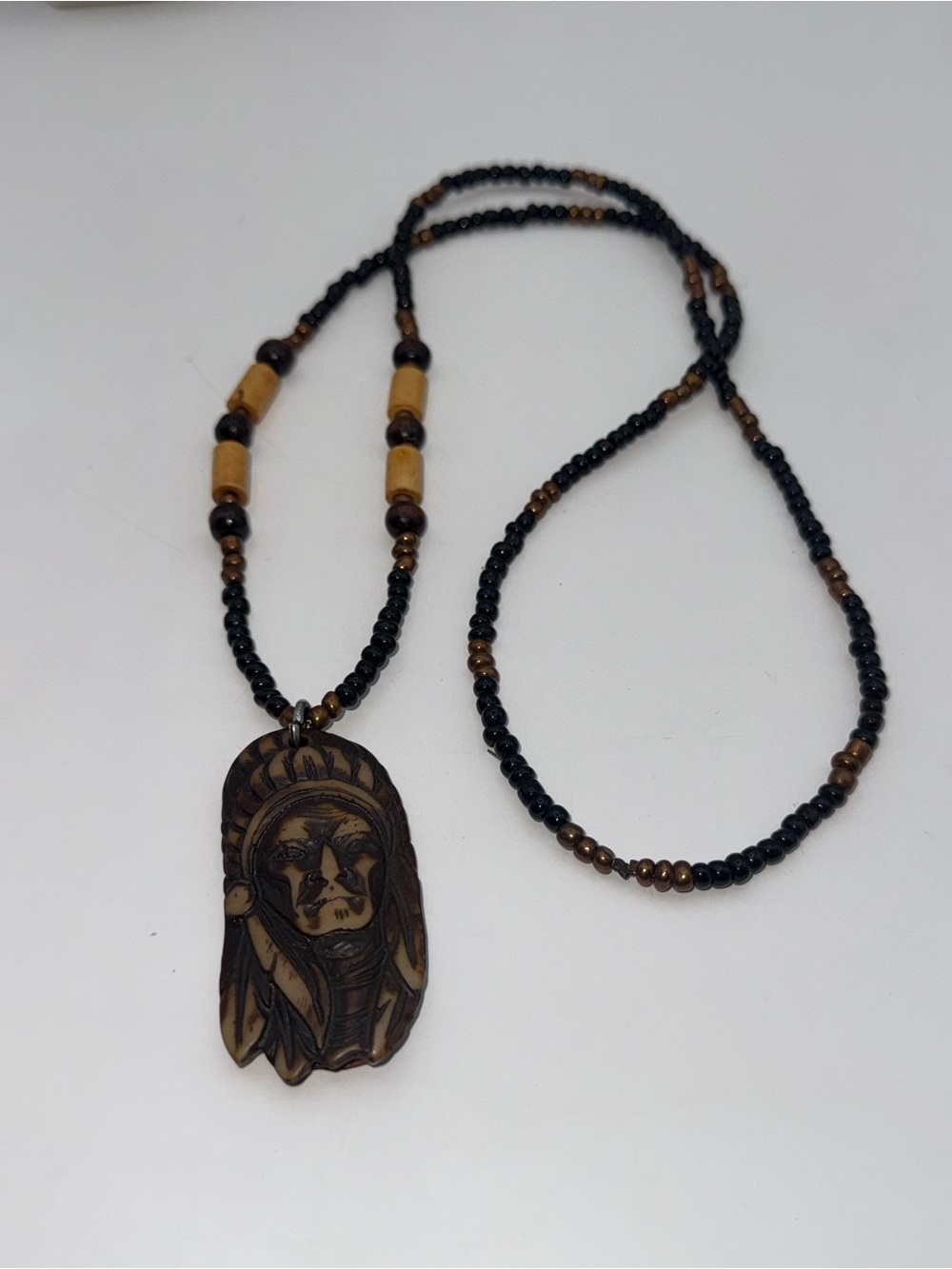 Handcraftede Black and Brown Beaded Necklace with Native Chief Pendant